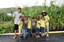 Gabe Sachter-Smith with Noelani students and teacher